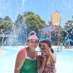 Students posing at Exchange Splash Pad; Camp Canopy 2024